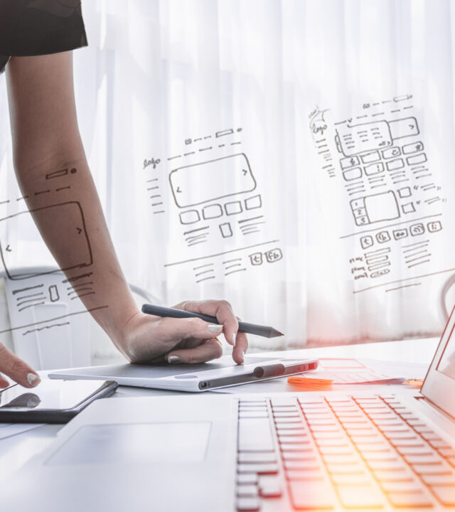 Web designer working on website layout and user experience planning